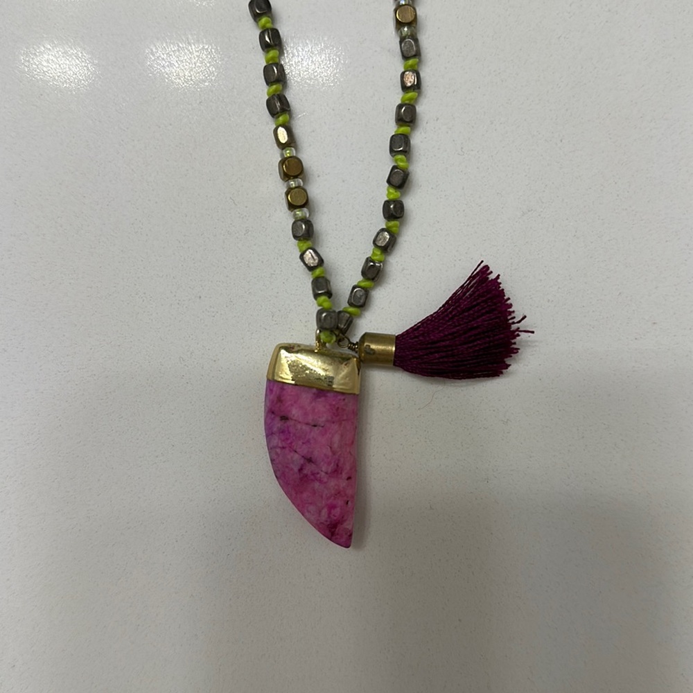 Long pink tooth necklace